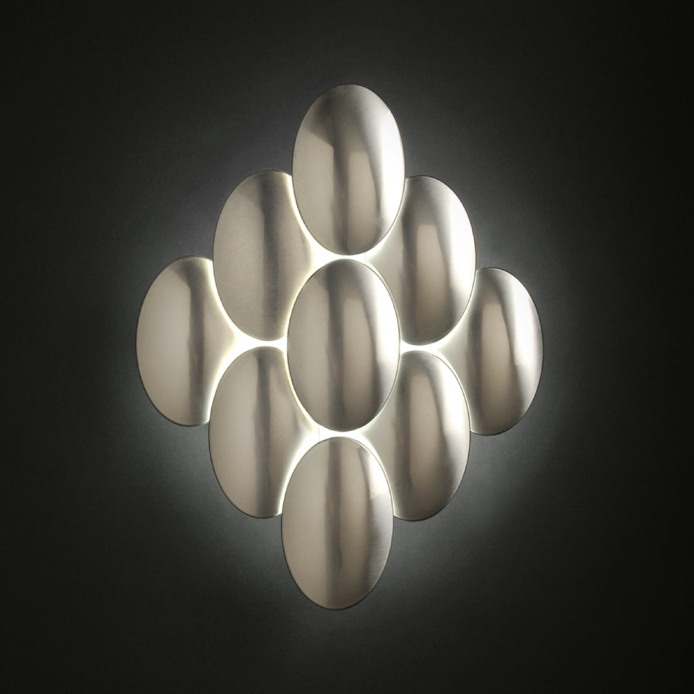 Obolo Wall Light by Zaneen Shop - A Oval shape light fixture