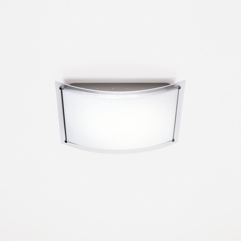 Vision Ceiling Light by Zaneen Shop - A chrome finished square ceiling light with a slight outward curve.