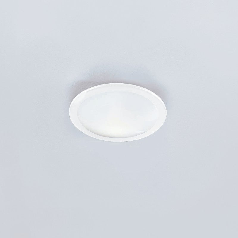 Tekna Ceiling Light by Zaneen Shop - A classic metal disc shape light fixture