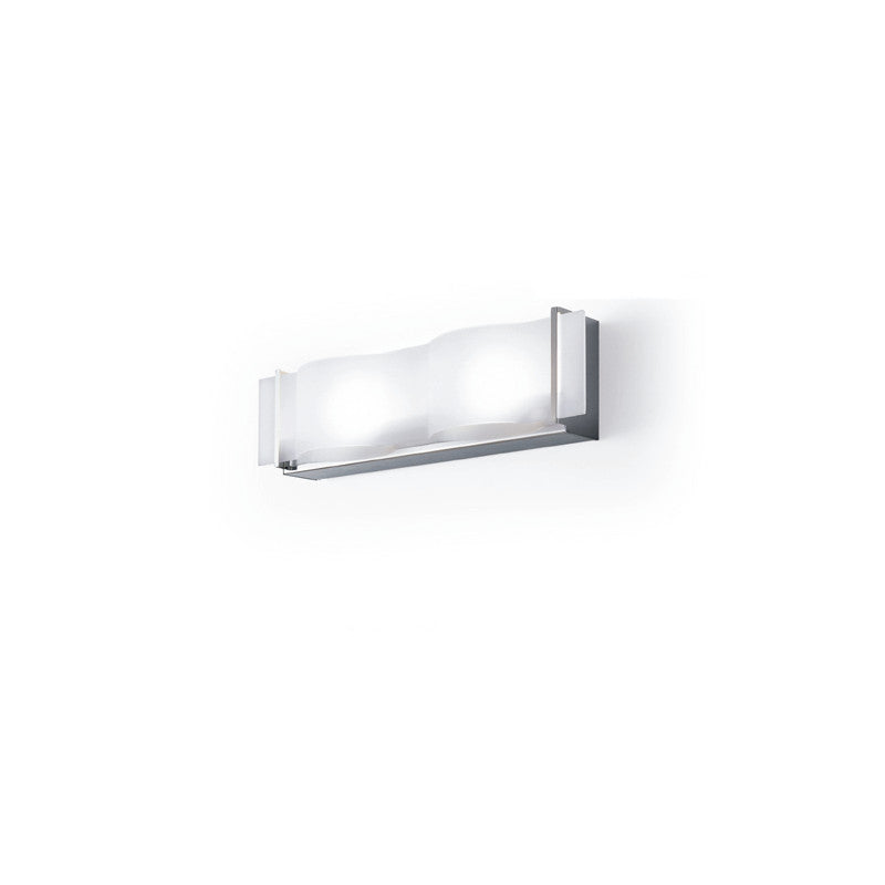 Internos Wall Light by Zaneen Shop - A rectangle shape wall lamp with a chrome base. This fixture features a frosted glass waved rectangle center light output.