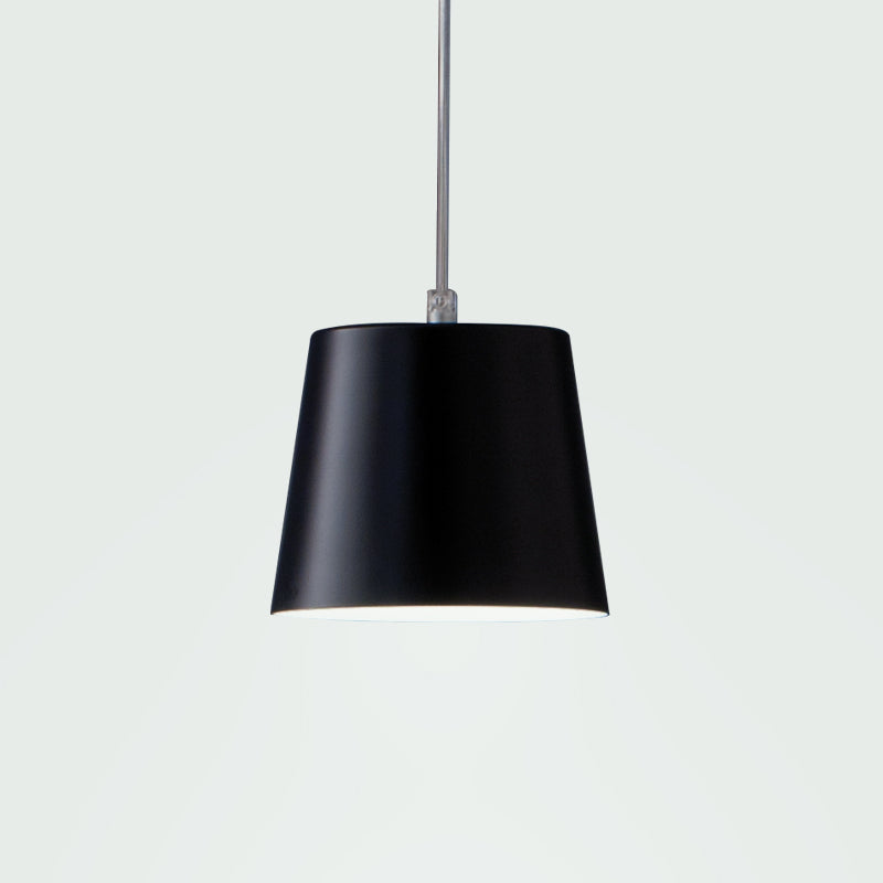 Amak Suspension Light by Zaneen Shop - A black or white color drum shape pendant lamp with an aluminum structure with a slight cone form. The upper part of the lampshade has a series of ventilation openings.