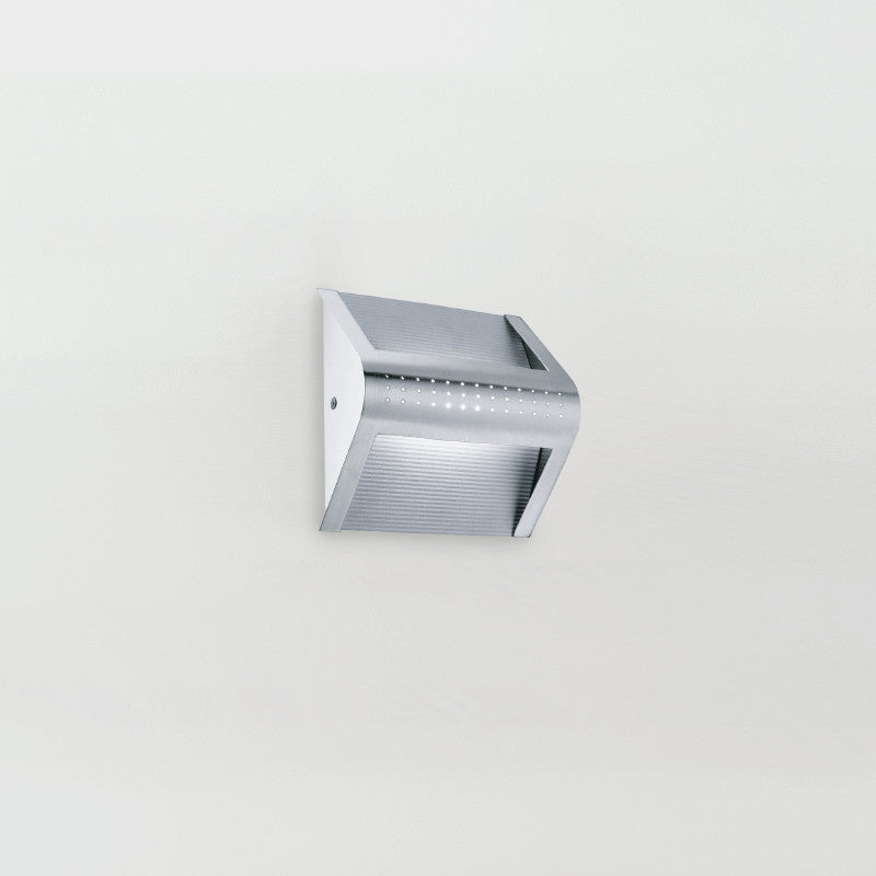 Hot Wall Light by Zaneen Shop - A chrome wall lamp that resembles the shape of a handle.