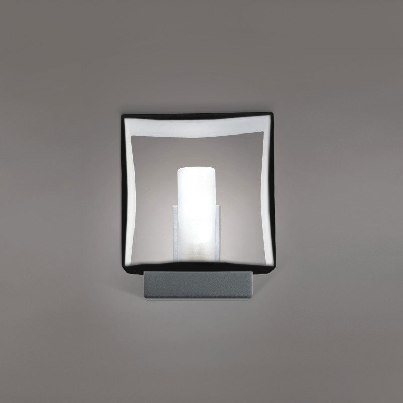 Domino Wall Light by Zaneen Shop - A hollowed cubed shape light.