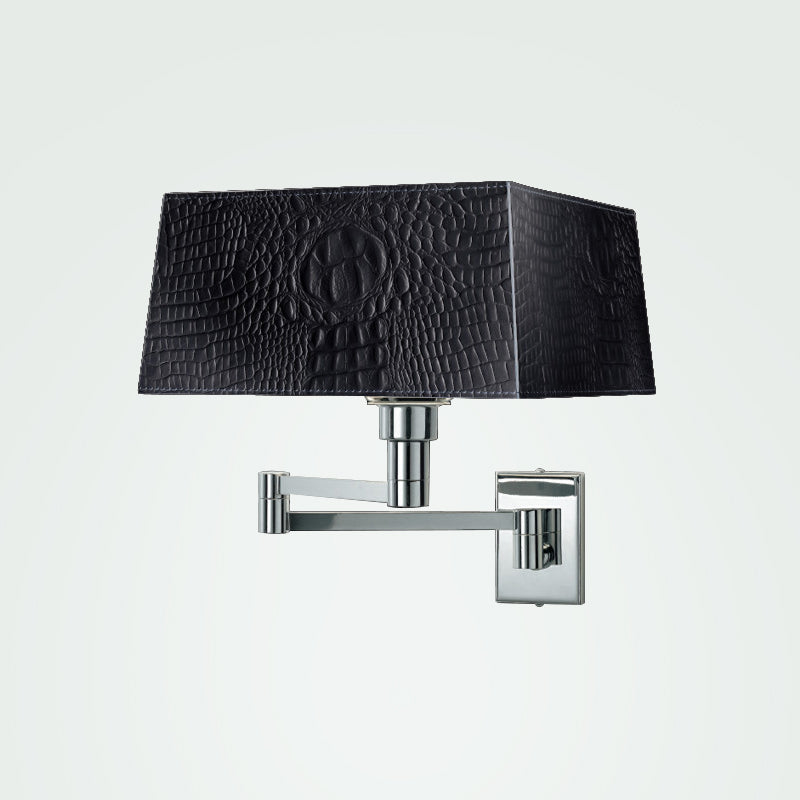 Carre Pelle Wall Light by Zaneen Shop - A wall lamp that features a nickel base and arm with a crocodile black lampshade.