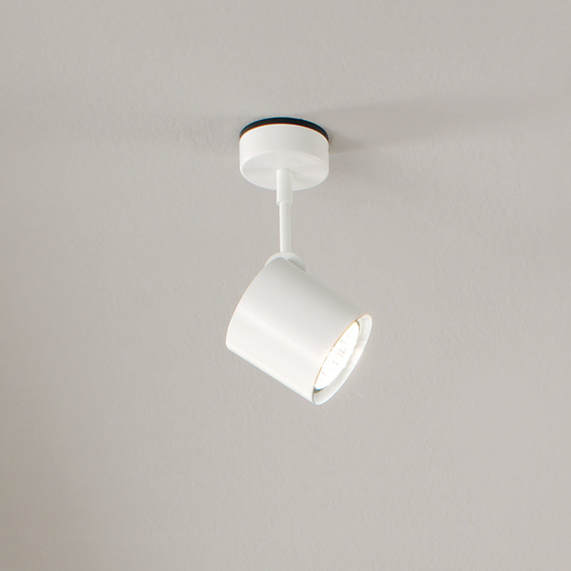 Kronn Ceiling Light by Zaneen Shop - A white colored cylindrical fixture.