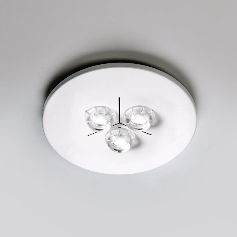 Polifemo Ceiling Light by Zaneen Shop - A Round shape light fixture with three circular glass bulbs in its center.