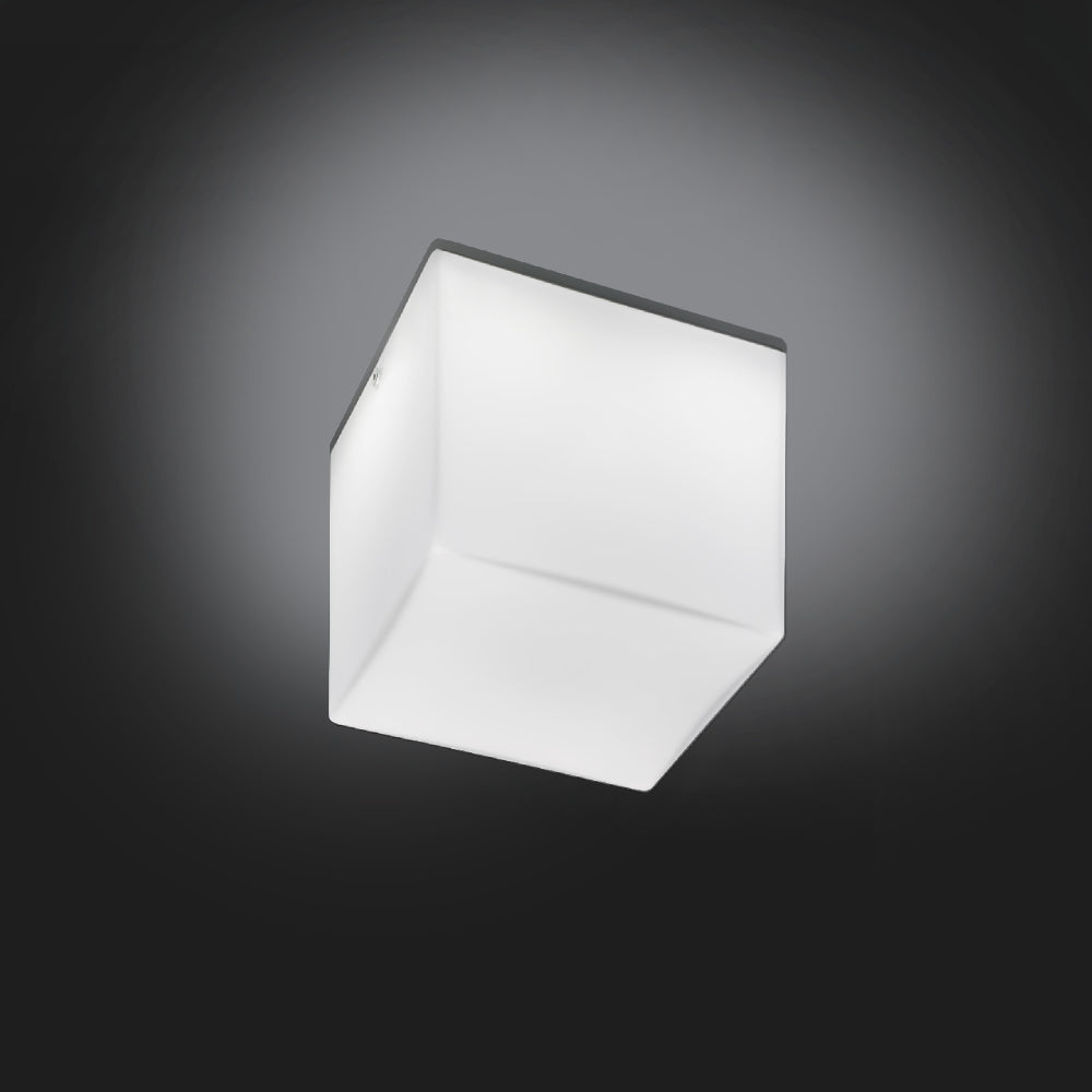 Kubik Ceiling Light by Zaneen Shop - A A metal cubic-shaped ceiling lamp with a milky white finish due to the five-layered hand-blown glass.